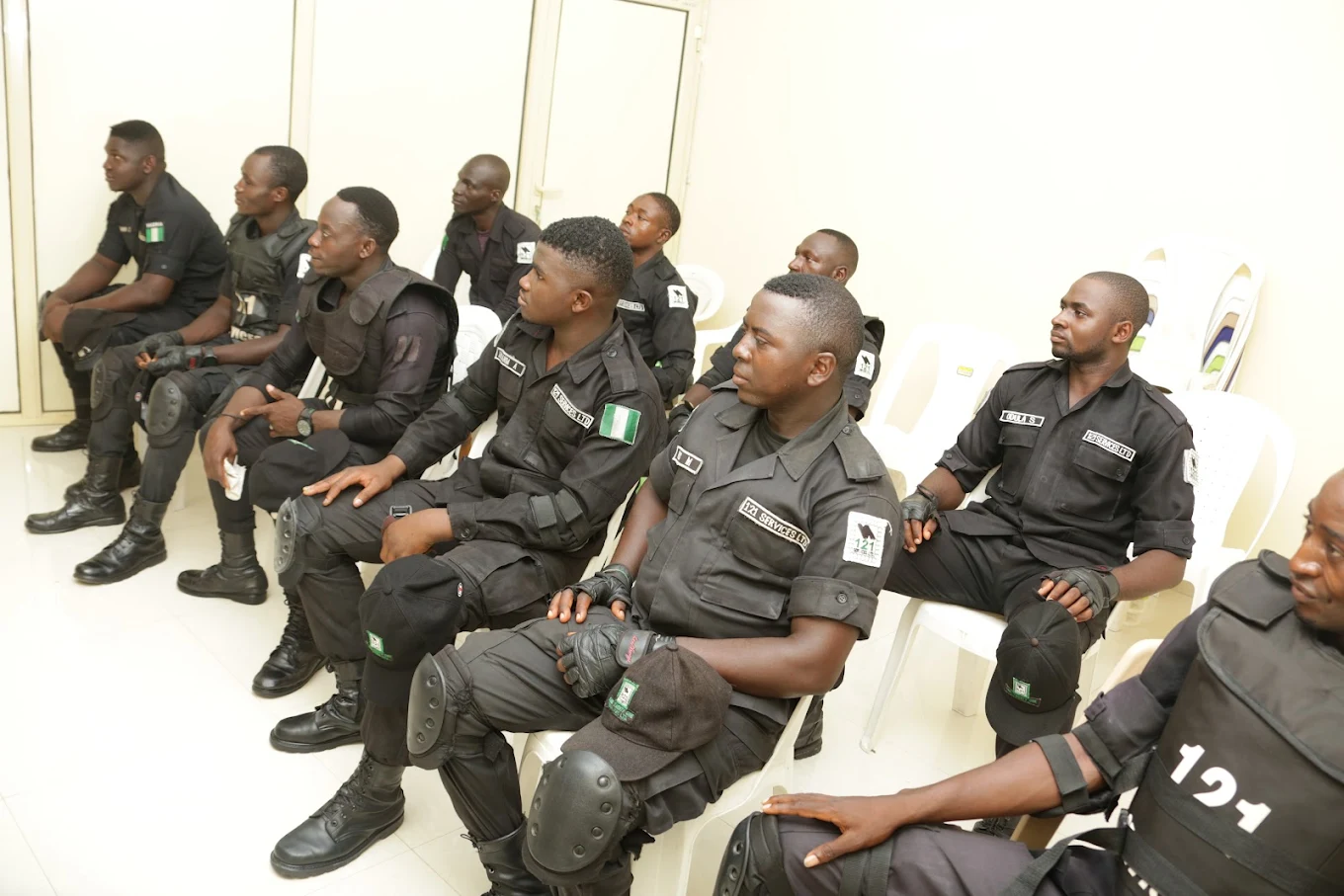 121 security officers listening during training